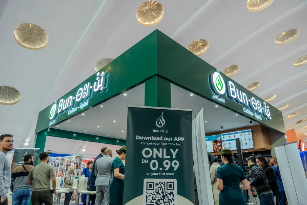 Visitors at a restaurant franchise stand